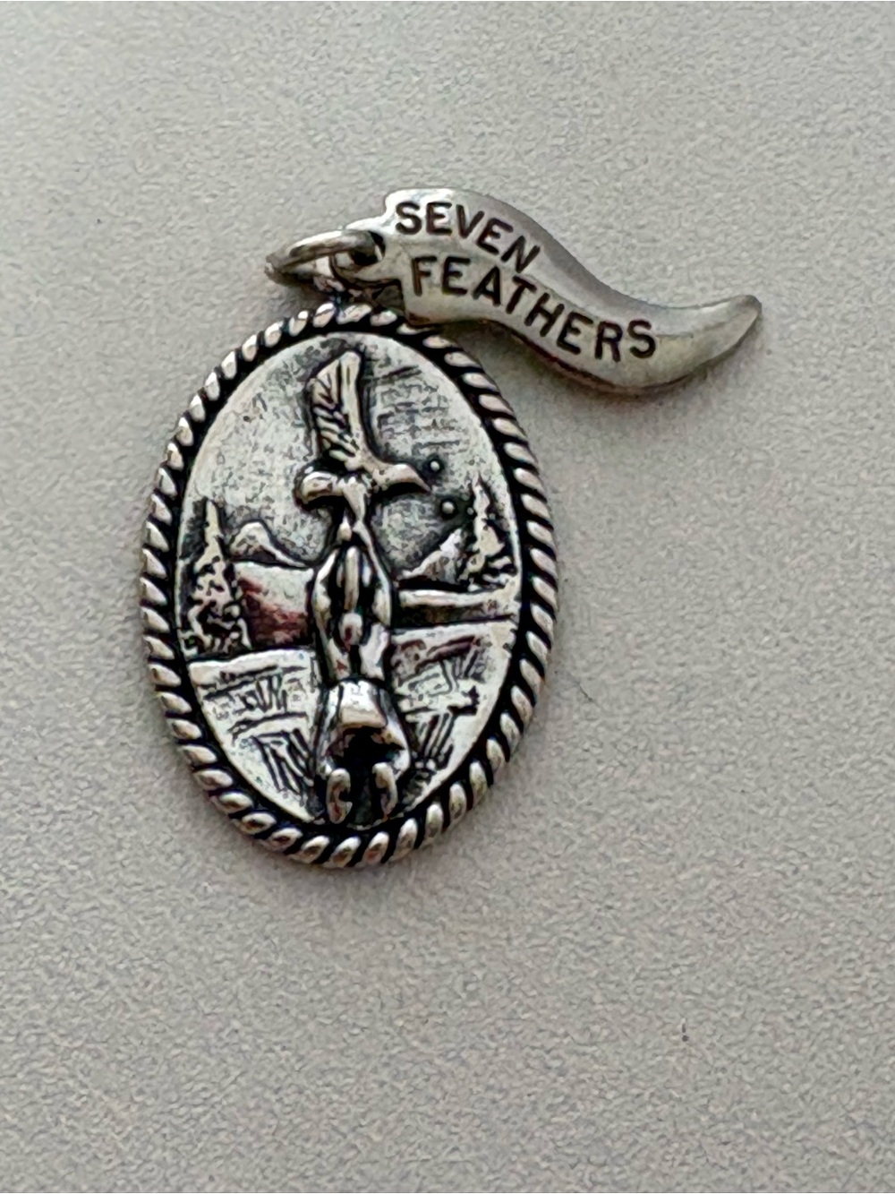 Seven Feathers Sterling Silver Pendant